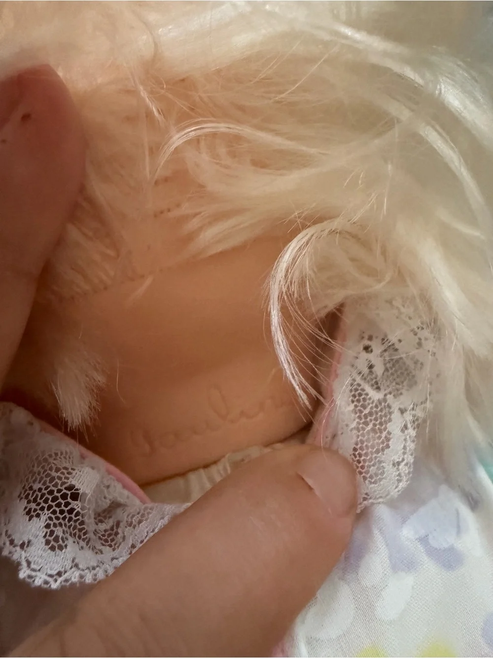 Doll by Pauline Blonde Vinyl Baby Doll with Embroidered Bib